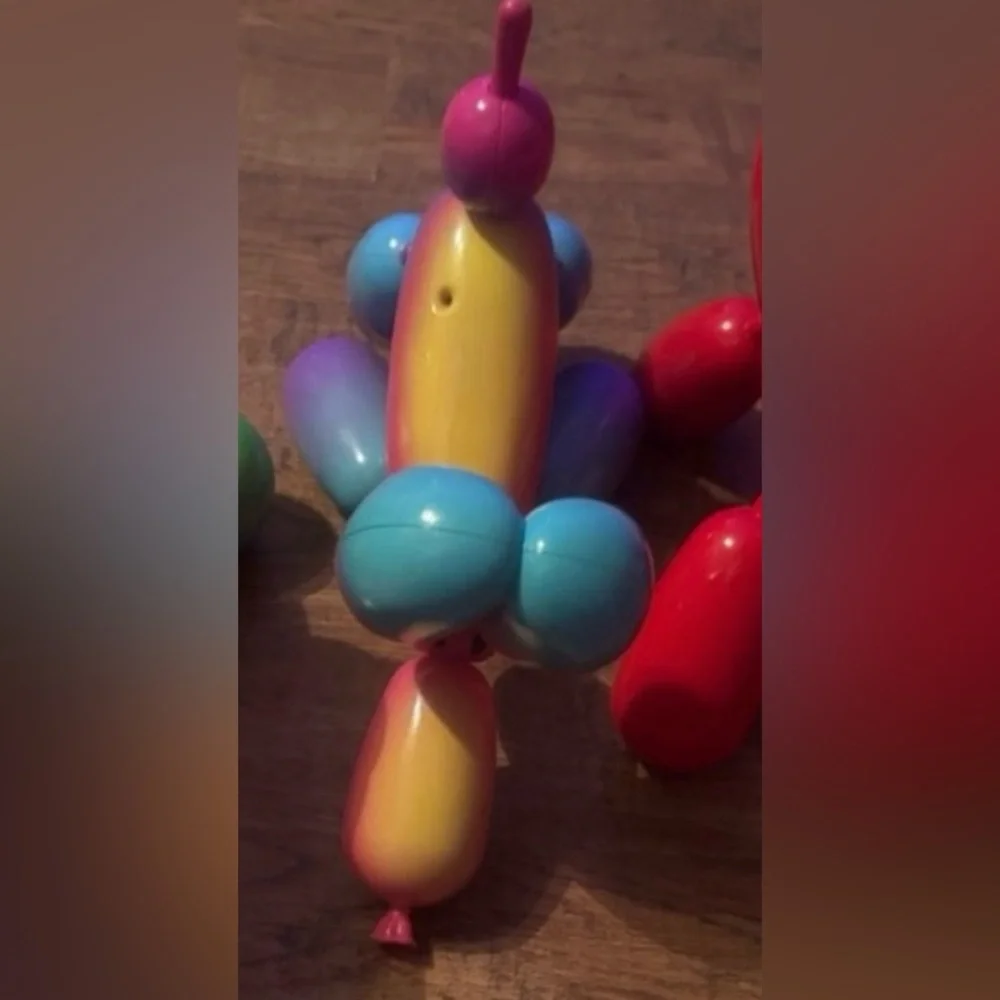 Squeakies interactive balloon animal rainbow dog
